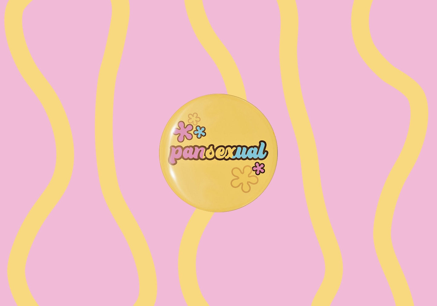 pansexual badge with yellow, blue and pink colours in a groovy style with flowers