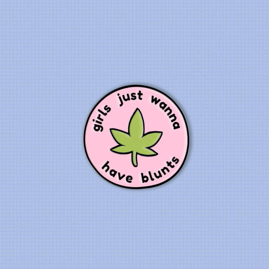 circular pink soft enamel pin with green weed leaf and the words &#39;girls just wanna have blunts&#39;